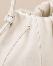 The Camellia Drawstring Shoulder Bag – Soft Ivory