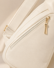 The Kensington Ivory Sling Crossbody Bag