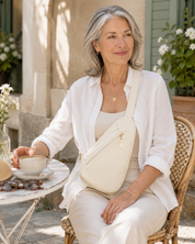 The Kensington Ivory Sling Crossbody Bag