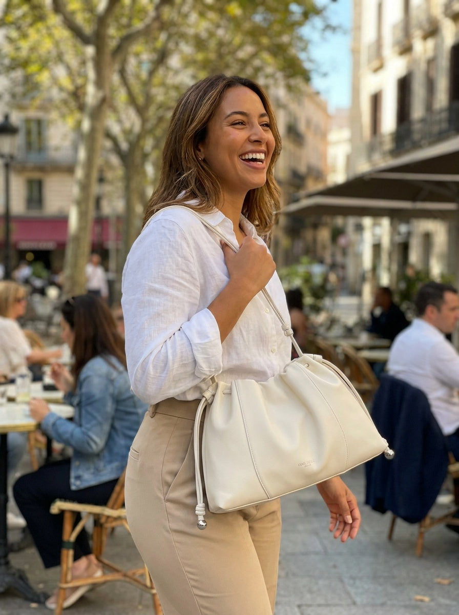 The Camellia Drawstring Shoulder Bag – Soft Ivory – lifestyle