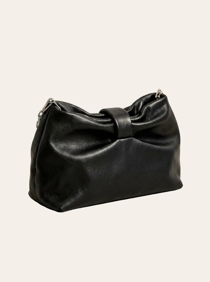 The Kensington Bow Clutch | Elegant Black Shoulder Bag – 3/4 angle