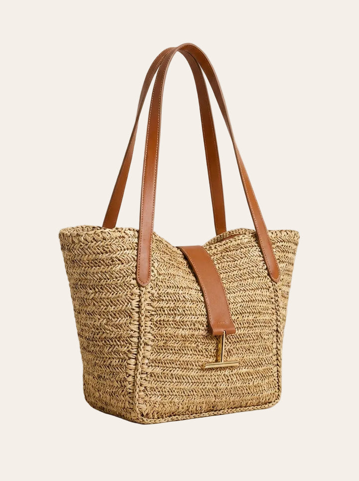 The Riviera Woven Tote – Natural Straw Tote with Tan Leather Trim – 3/4 angle